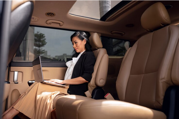 Screenshot 2024-10-24 at 13-16-17 Free Photo Businesswoman sitting in the backseat of a taxi