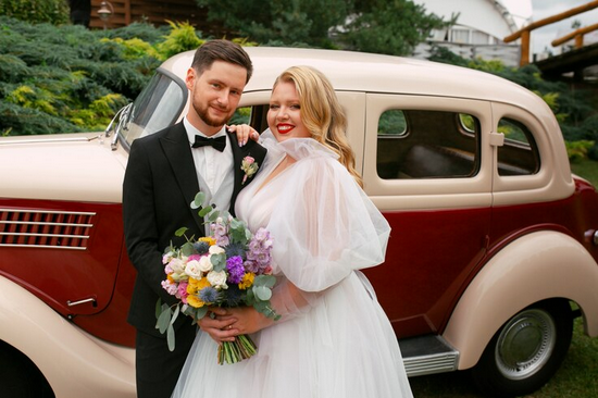 Screenshot 2024-10-25 at 15-05-28 Free Photo Medium shot married couple posing with vintage car