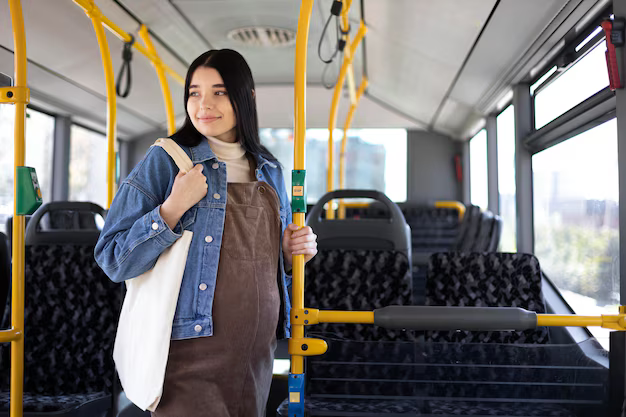 medium-shot-pregnant-woman-traveling-by-bus_23-2148989565.jpg (AVIF Image 626 × 417 pixels)