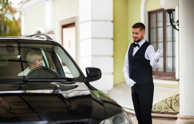 Screenshot 2024-11-18 at 13-50-21 parking-valet-welcoming-woman-with-car_23-2149946623.jpg (AVIF Image 626 × 417 pixels)