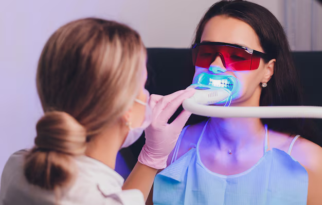 close-up-portrait-female-patient-visiting-dentist-teeth-whitening-clinic-teeth-whitening-procedure_152904-7265.jpg (AVIF Image 626 × 417 pixels)