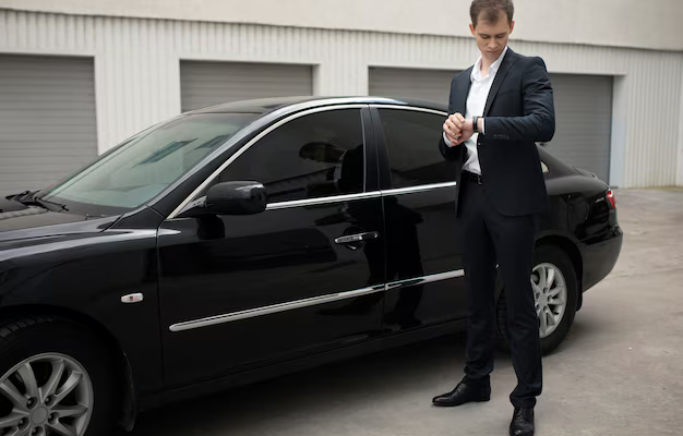 elegant-man-standing-his-car-taxi-services_23-2149149593.jpg (AVIF Image 626 × 417 pixels) (2)