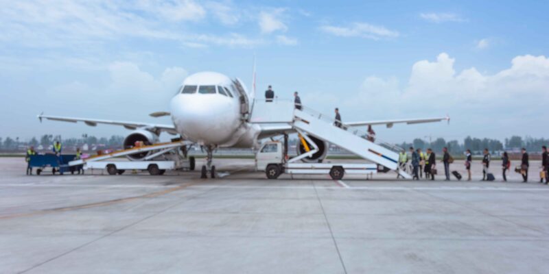 people-boarding-airplane-runway (1)