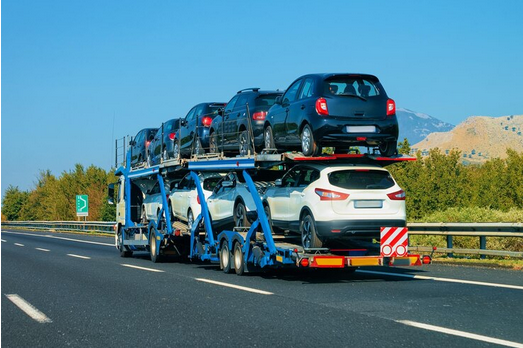 Screenshot 2024-12-12 at 12-09-26 Premium Photo Car carrier at the road. Truck transporter