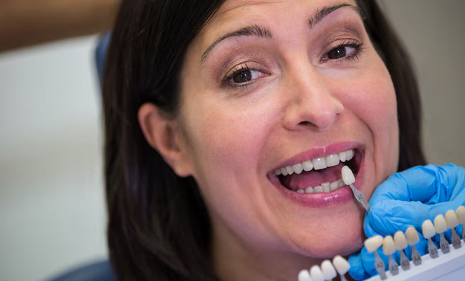 Screenshot 2024-12-13 at 12-40-31 Free Photo Dentist examining female patient with teeth shades