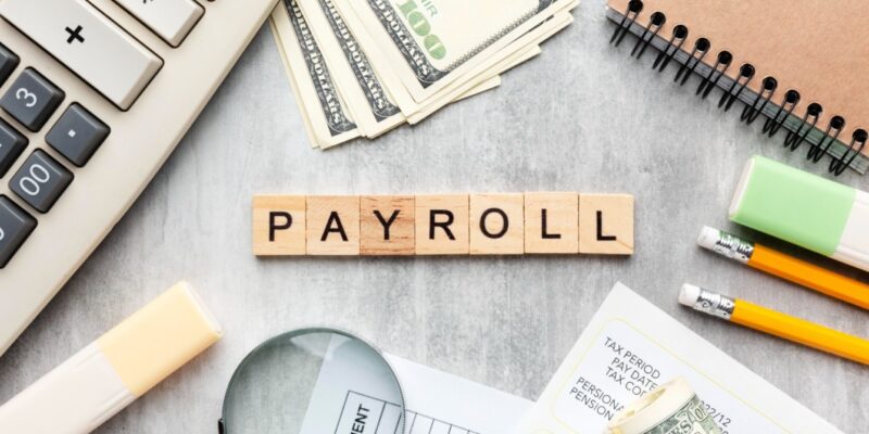 top-view-payroll-concept-with-items (1) (1) (1) (1)